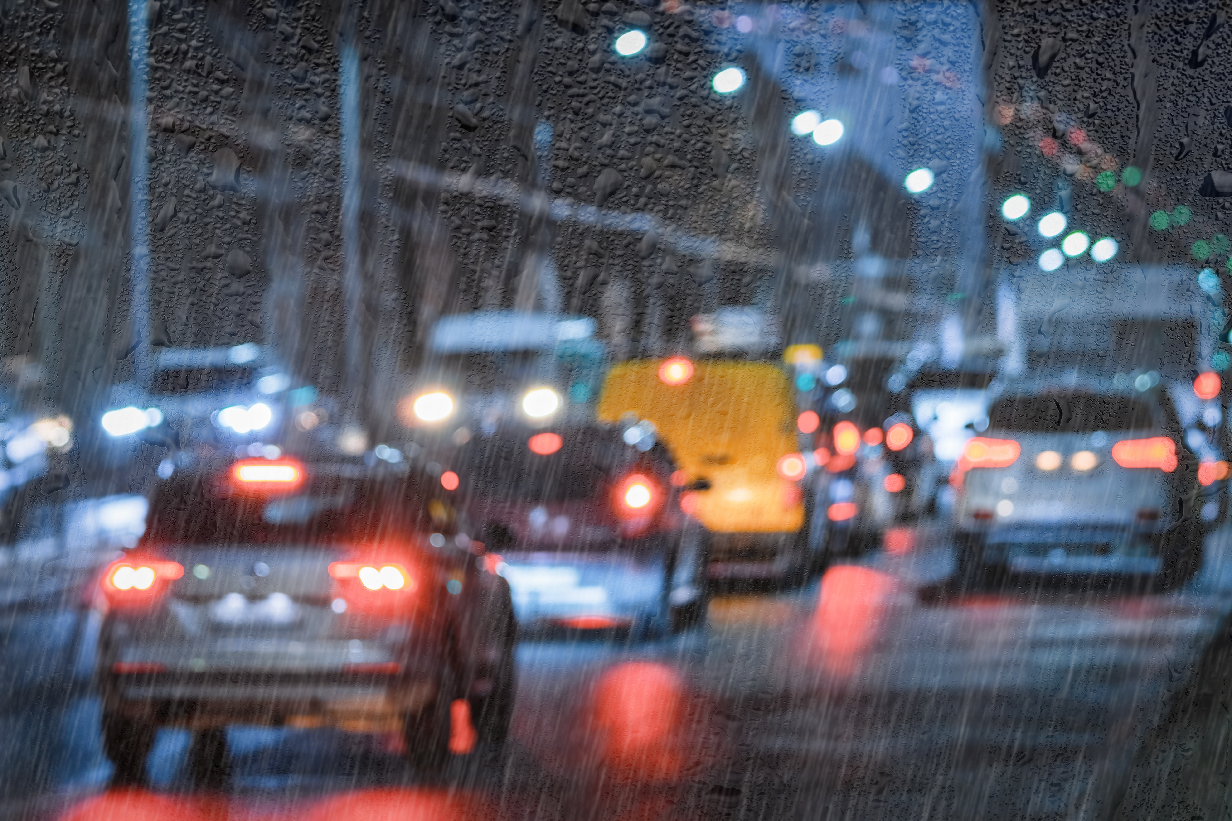 Cars In Rainy Traffic